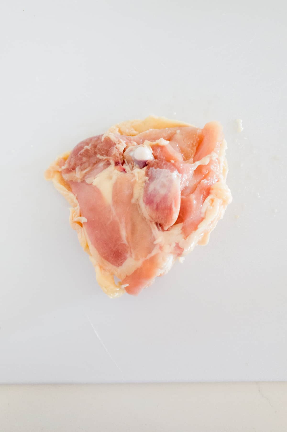 raw chicken thigh